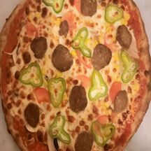 Pizza légumes et viande 