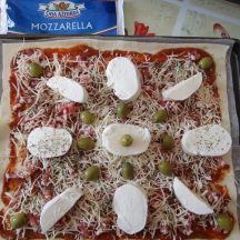 Pizza rectangulaire aux lardons et mozzarella Casa Azzurra